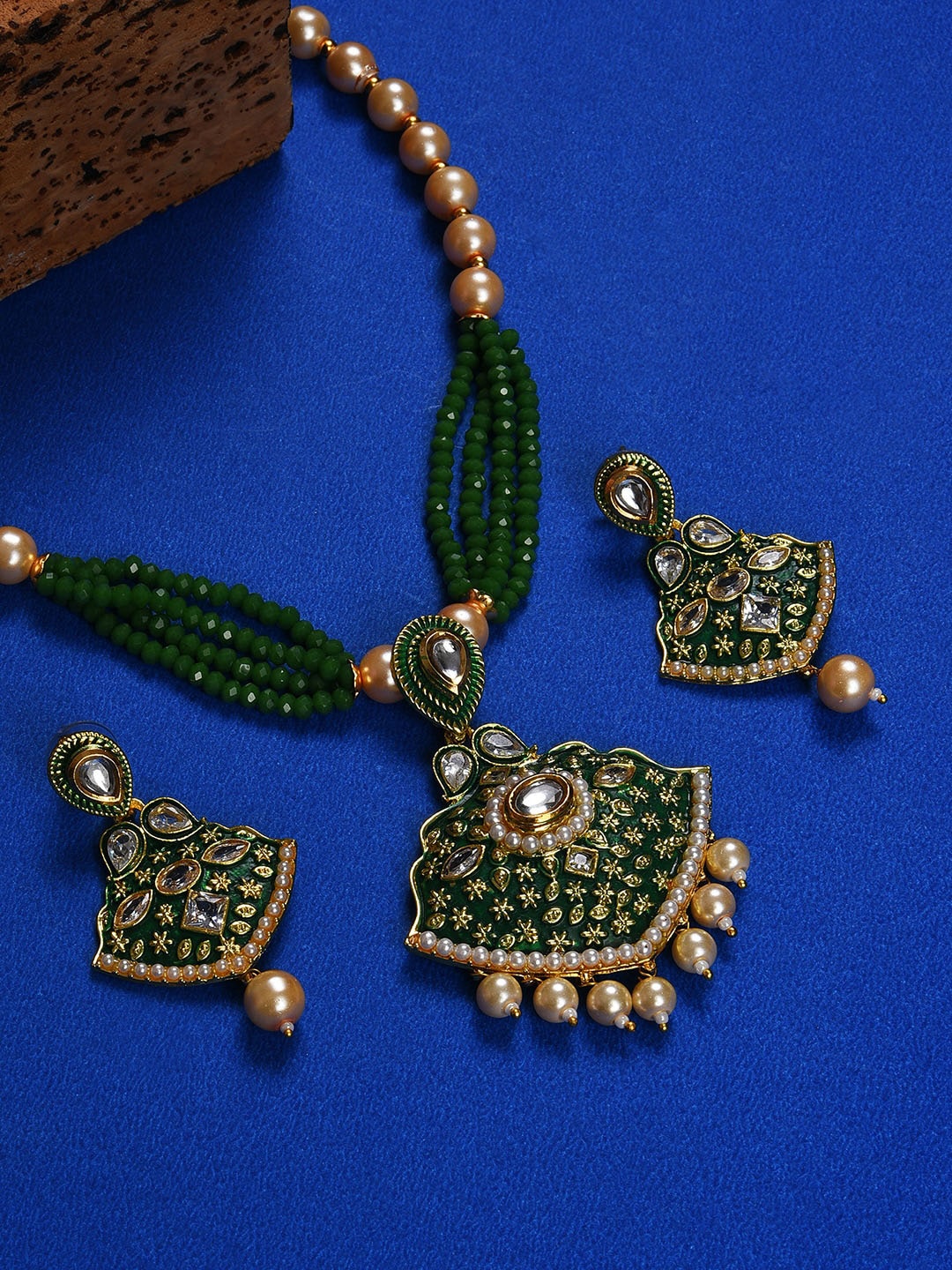 

SOHI Gold-Plated Green & White Stone Studded & Pearl beaded Jewellery Set