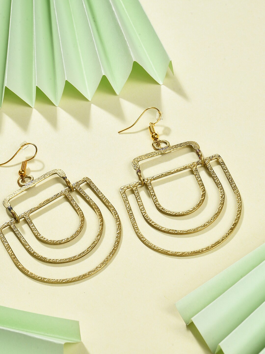 

SOHI Gold-Toned Contemporary Studs Earrings