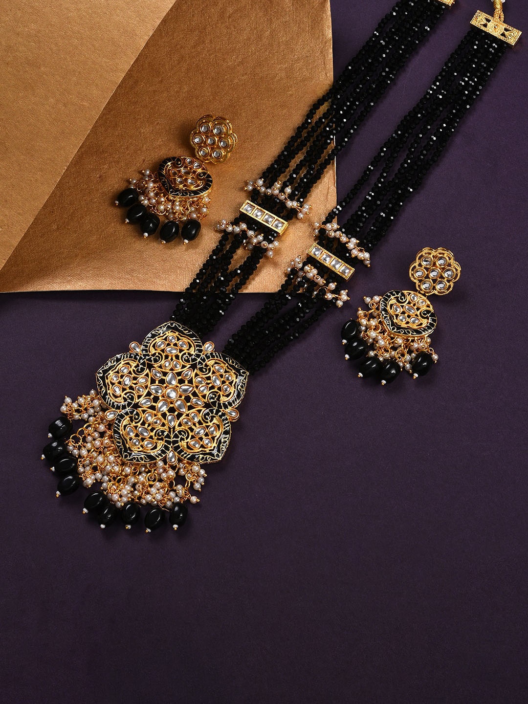 

SOHI Gold-Plated Black & White Kundan Studded & beaded Jewellery Set