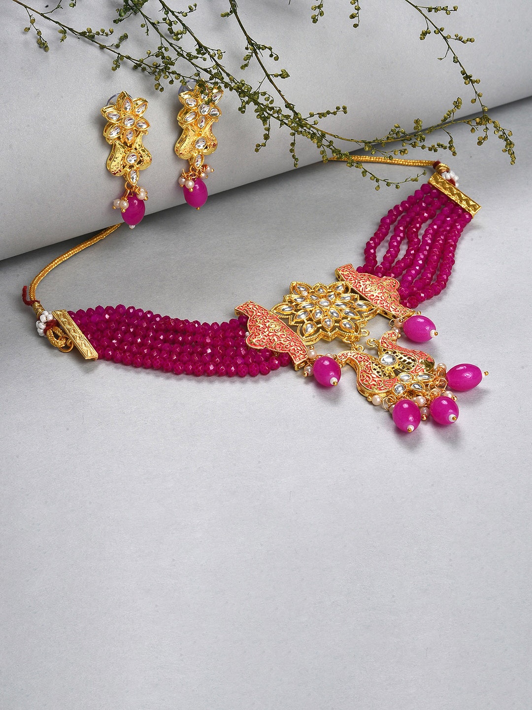 

SOHI Women Gold-Plated & Pink Stone Studded Jewellery Set