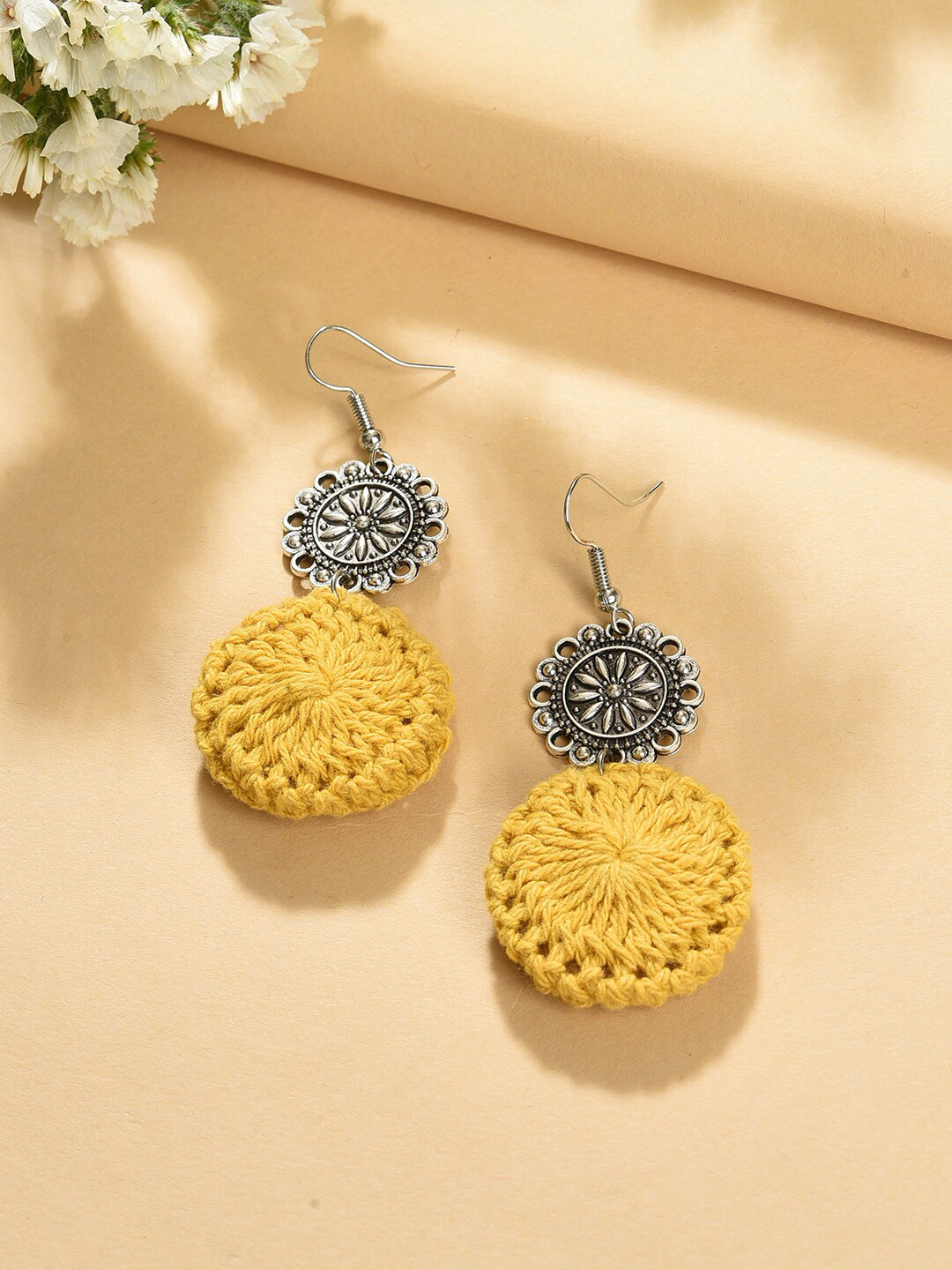 

SOHI Yellow Silver Plated Contemporary Drop Earrings