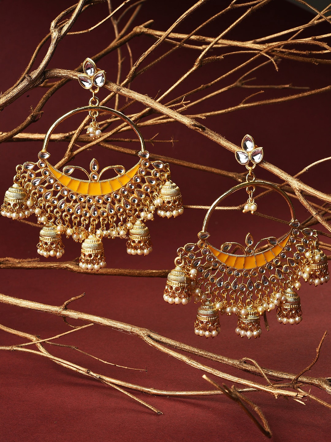 

SOHI Gold-Plated Yellow Contemporary Chandbalis Earrings