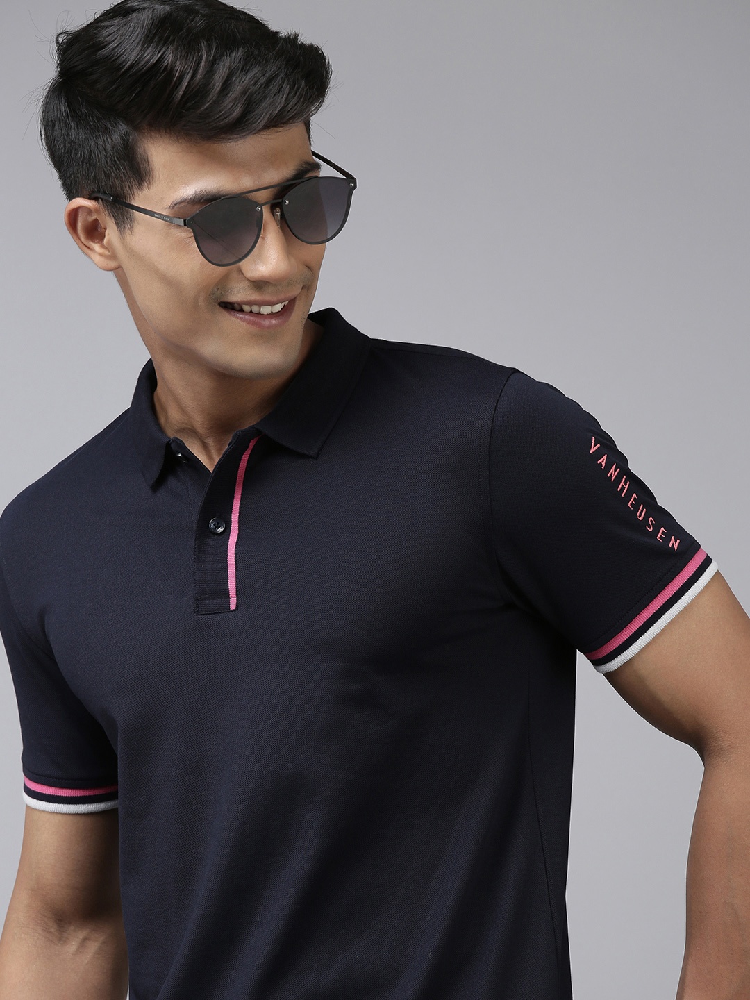 

Van Heusen Sport Men Navy Blue Solid Polo Collar Casual T-shirt