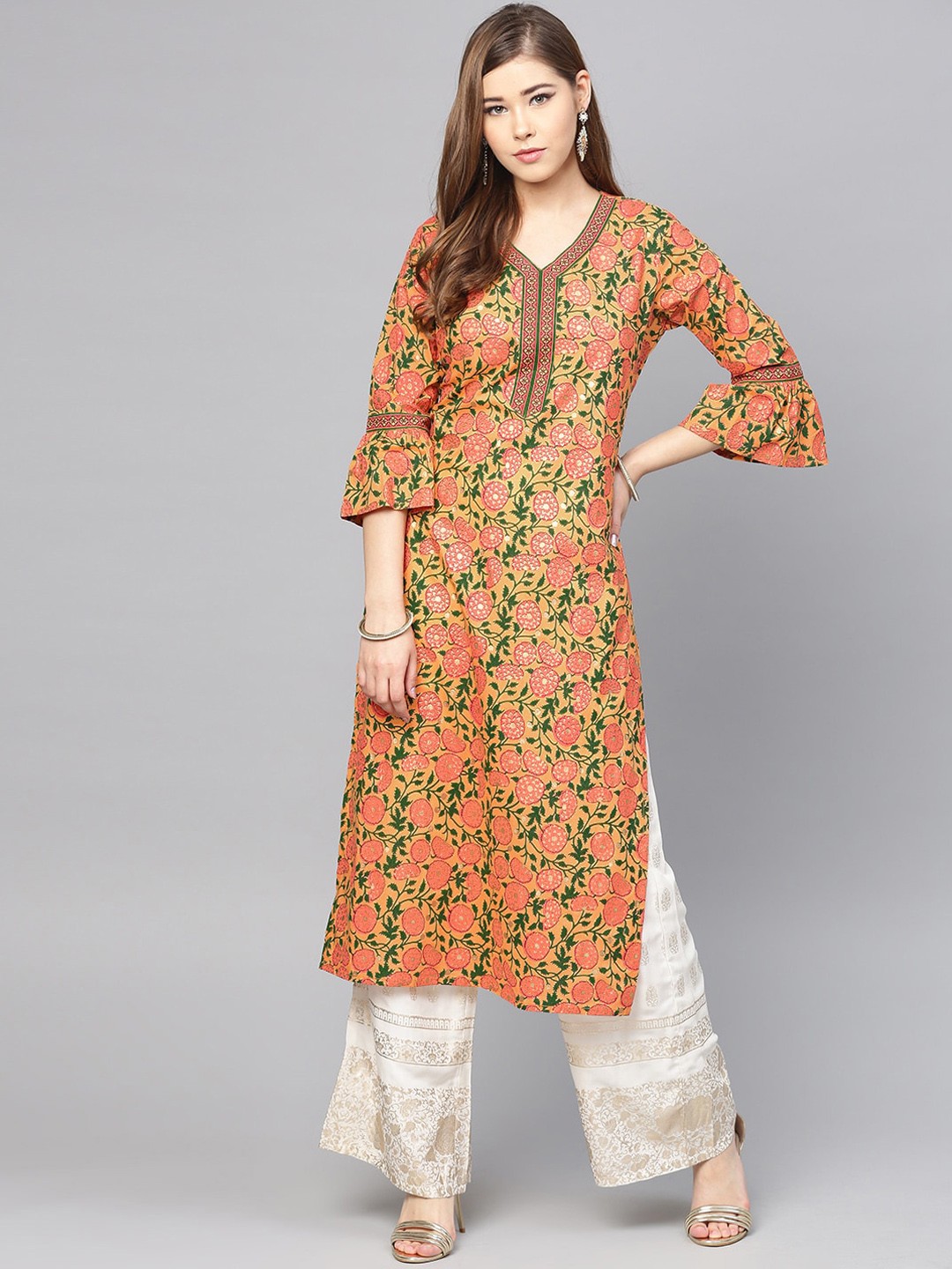 

Varanga Women Peach & Green Ethnic Motifs Printed Kurta