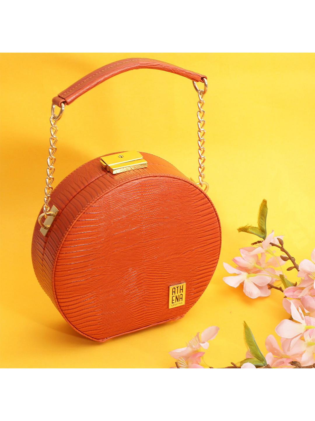 

Athena Orange Textured Box Clutch