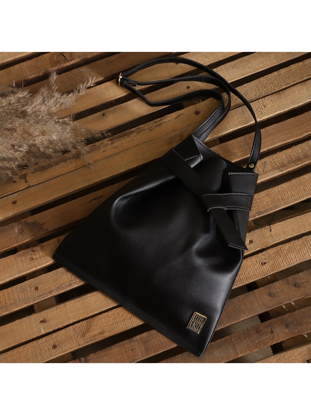 

Athena Black PU Structured Sling Bag