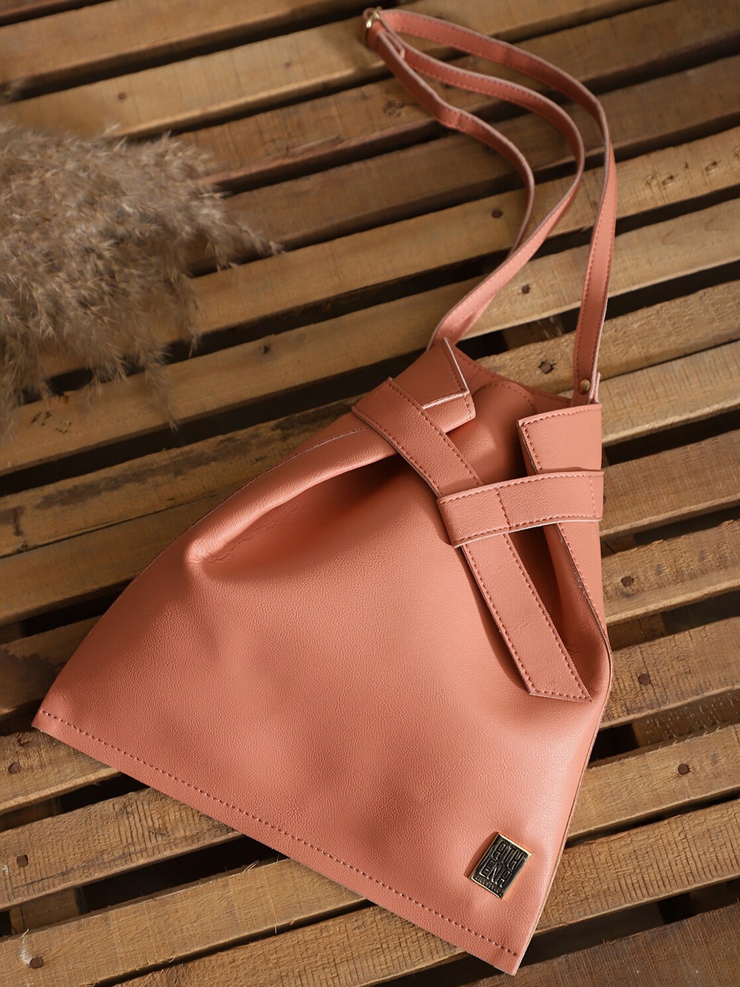 

Athena Pink PU Structured Sling Bag with Bow Detail