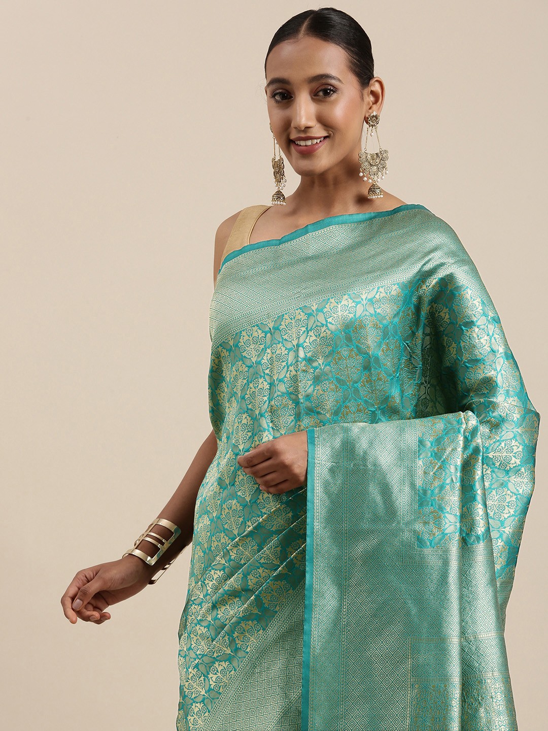 

Shaily Green & Silver Ethnic Motifs Woven Design Banarasi Saree