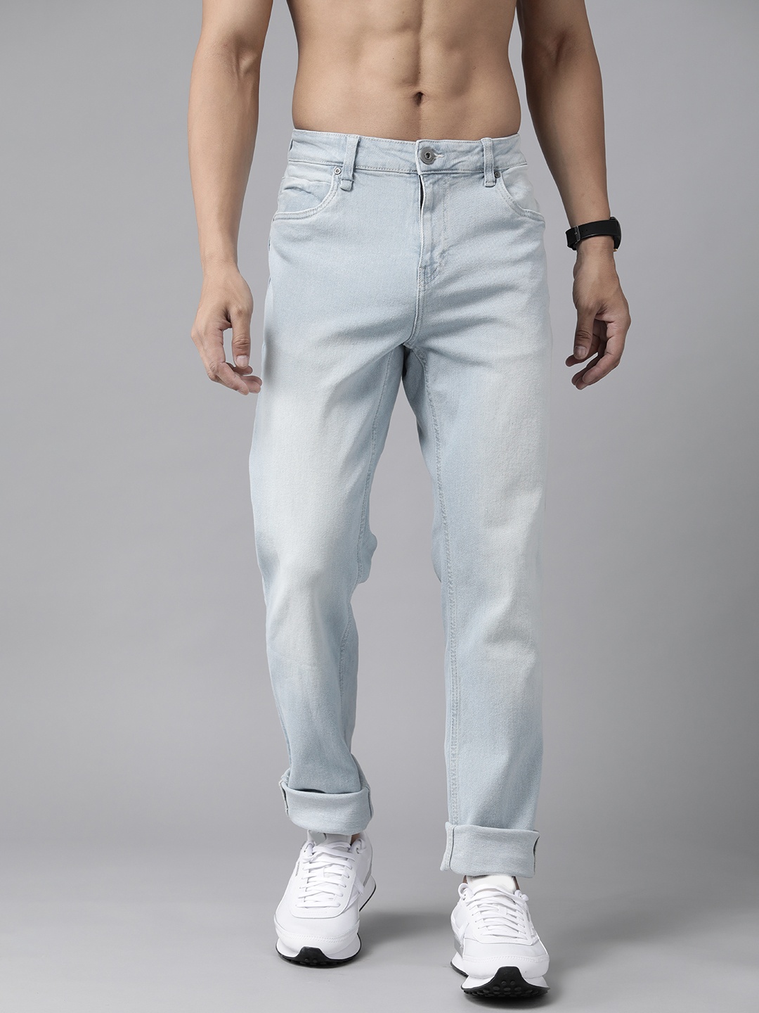 

The Roadster Lifestyle Co Men Blue Slim Fit Mid-Rise Heavy Fade Stretchable Jeans