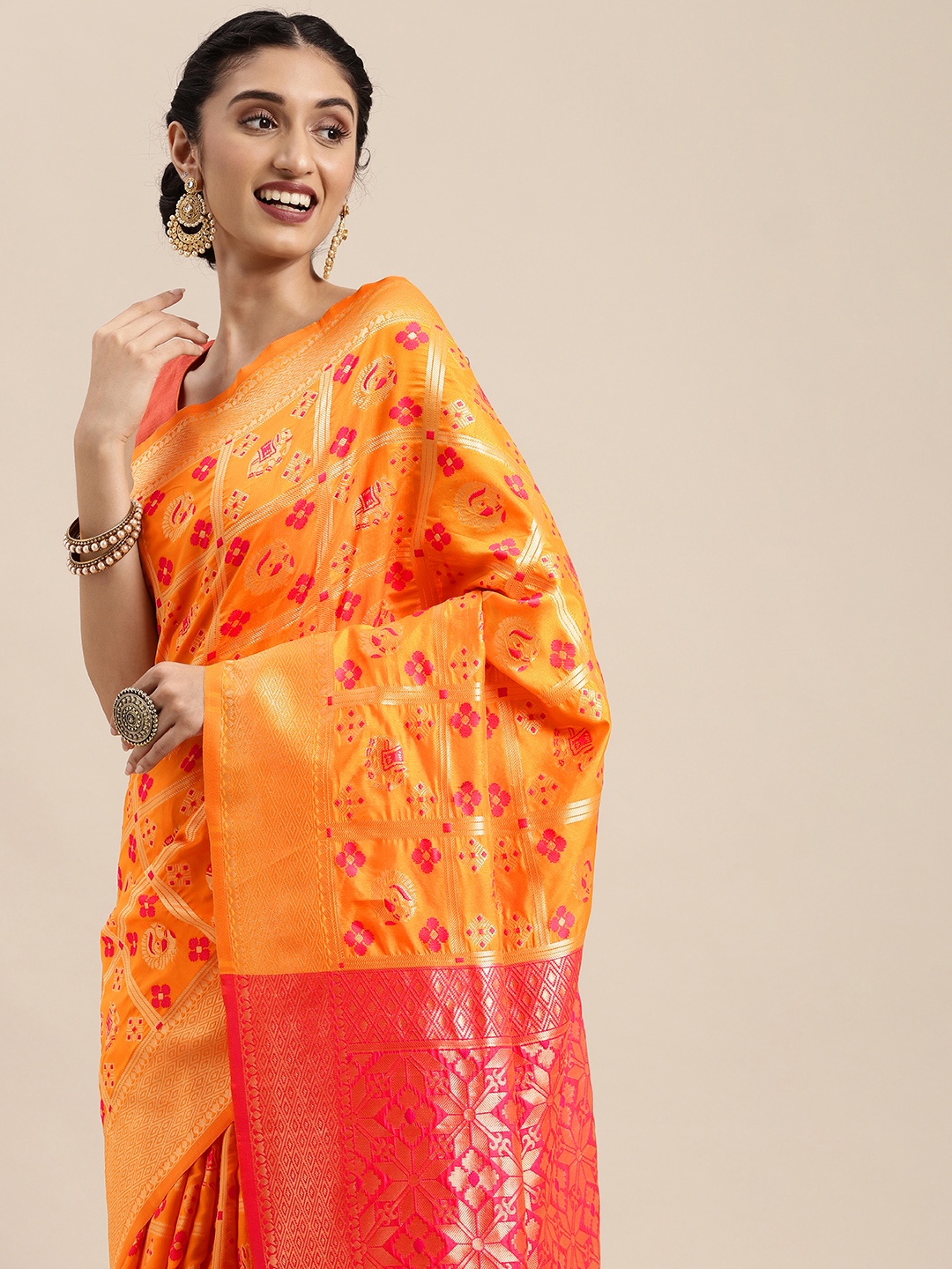 

Mitera Mustard Yellow & Golden Woven Design Zari Silk Blend Patola Saree