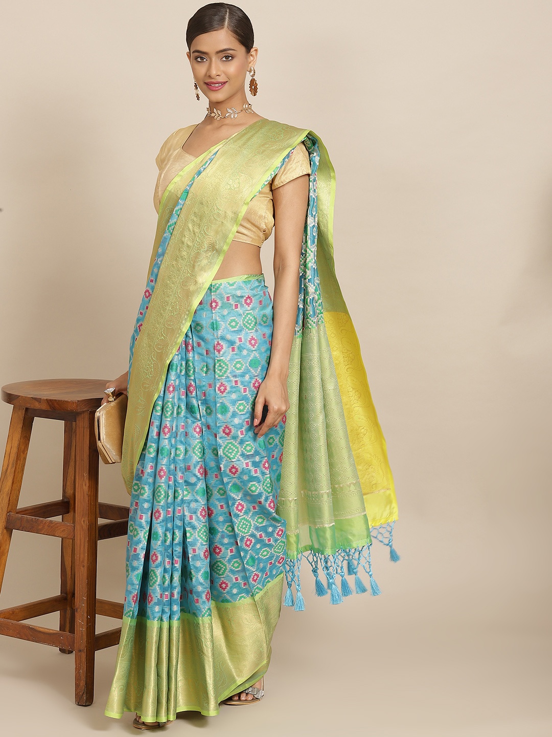 

Silk Land Blue & Green Woven Design Zari Ikat Saree