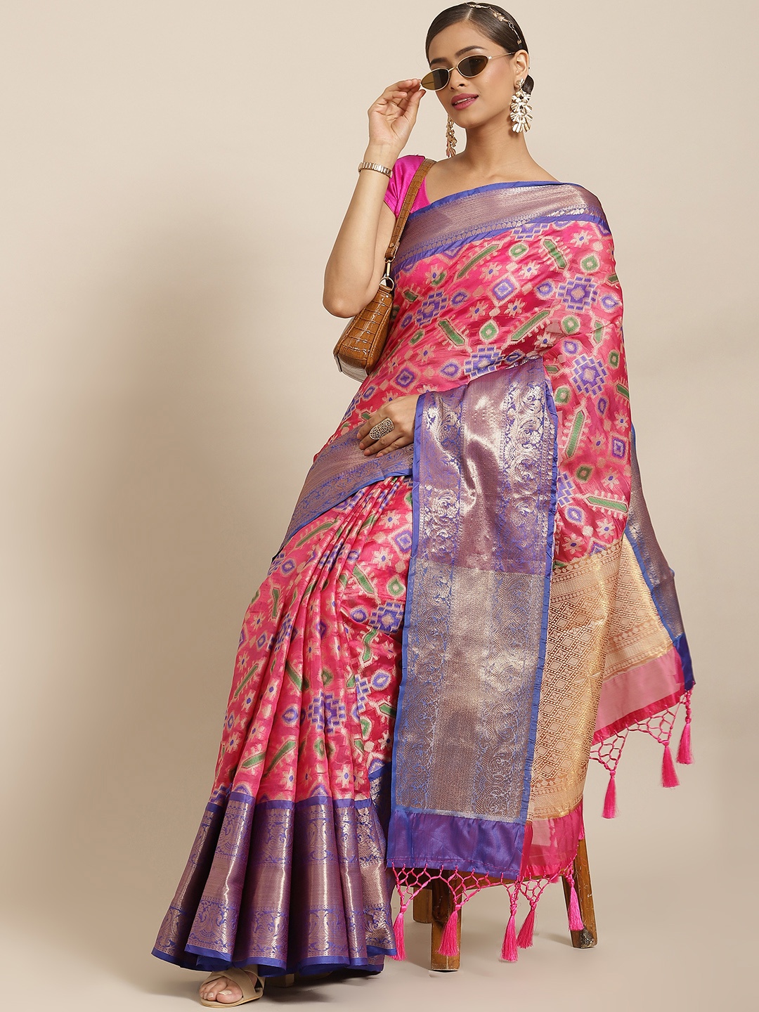 

Silk Land Pink & Violet Ethnic Motifs Woven Design Zari Ikat Saree