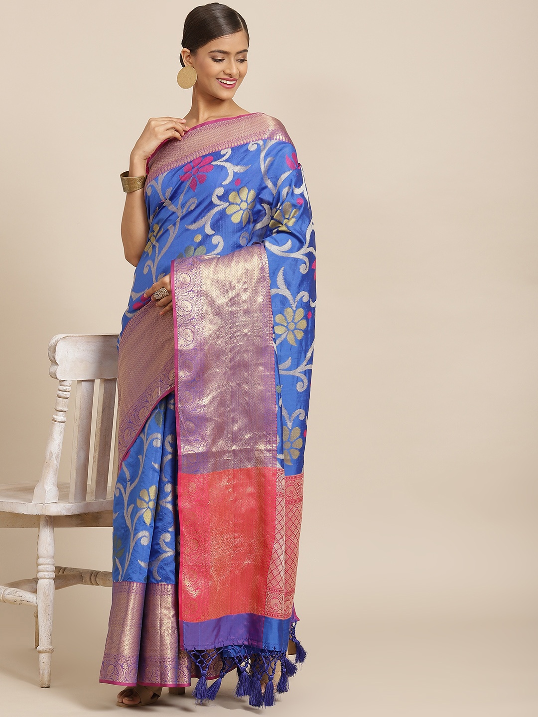 

Silk Land Blue Floral Woven Design Zari Ikat Saree