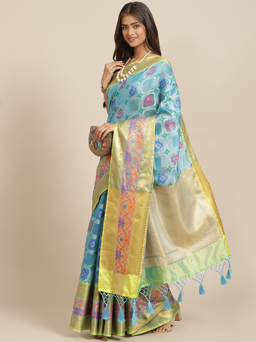 

Silk Land Blue & Pink Ethnic Motifs Woven Design Zari Ikat Saree