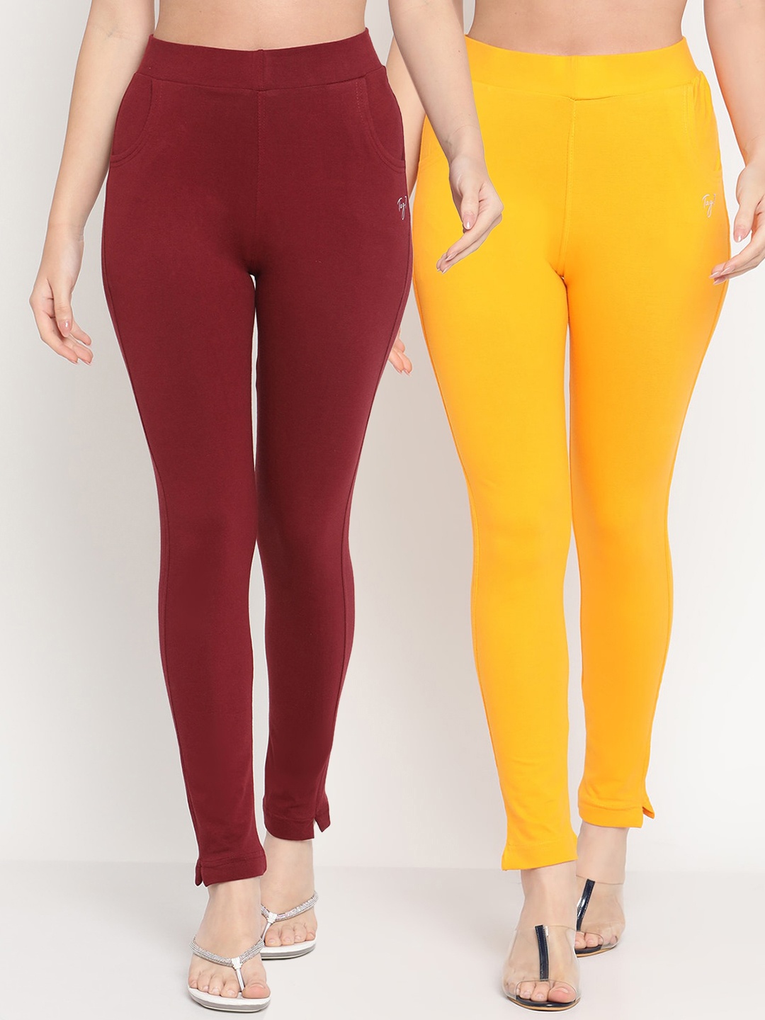 

TAG 7 Women Maroon & Yellow Solid Ankle Length Leggings Set Of 2