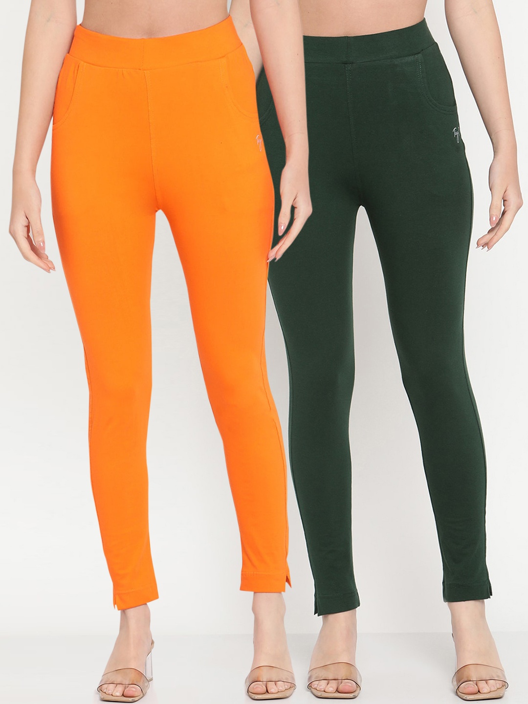 

TAG 7 Women Pack of 2 Orange & Green Solid Kurti Pants