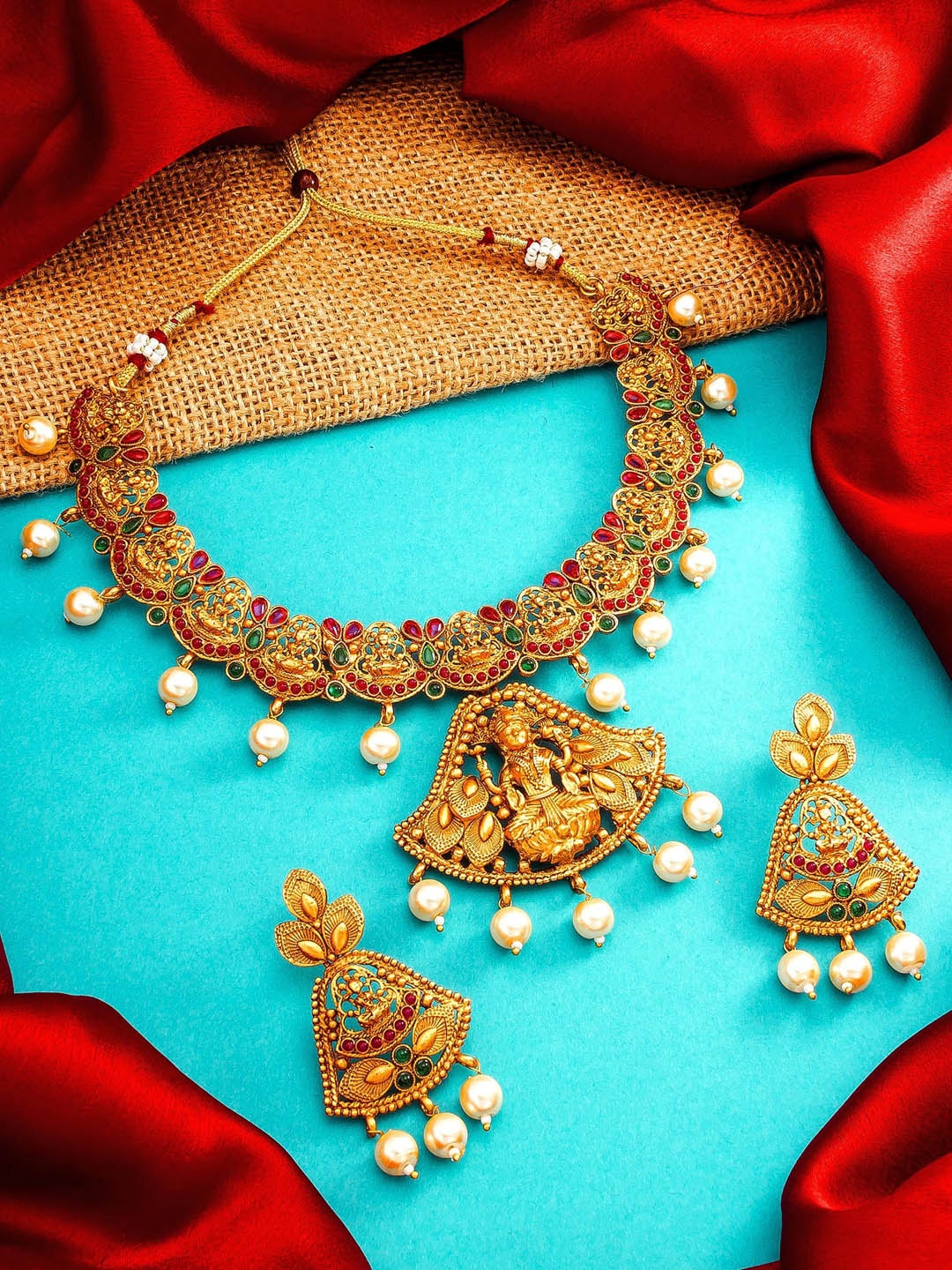 

aadita Gold Plated Pearls Choker Temple Jewellery Set