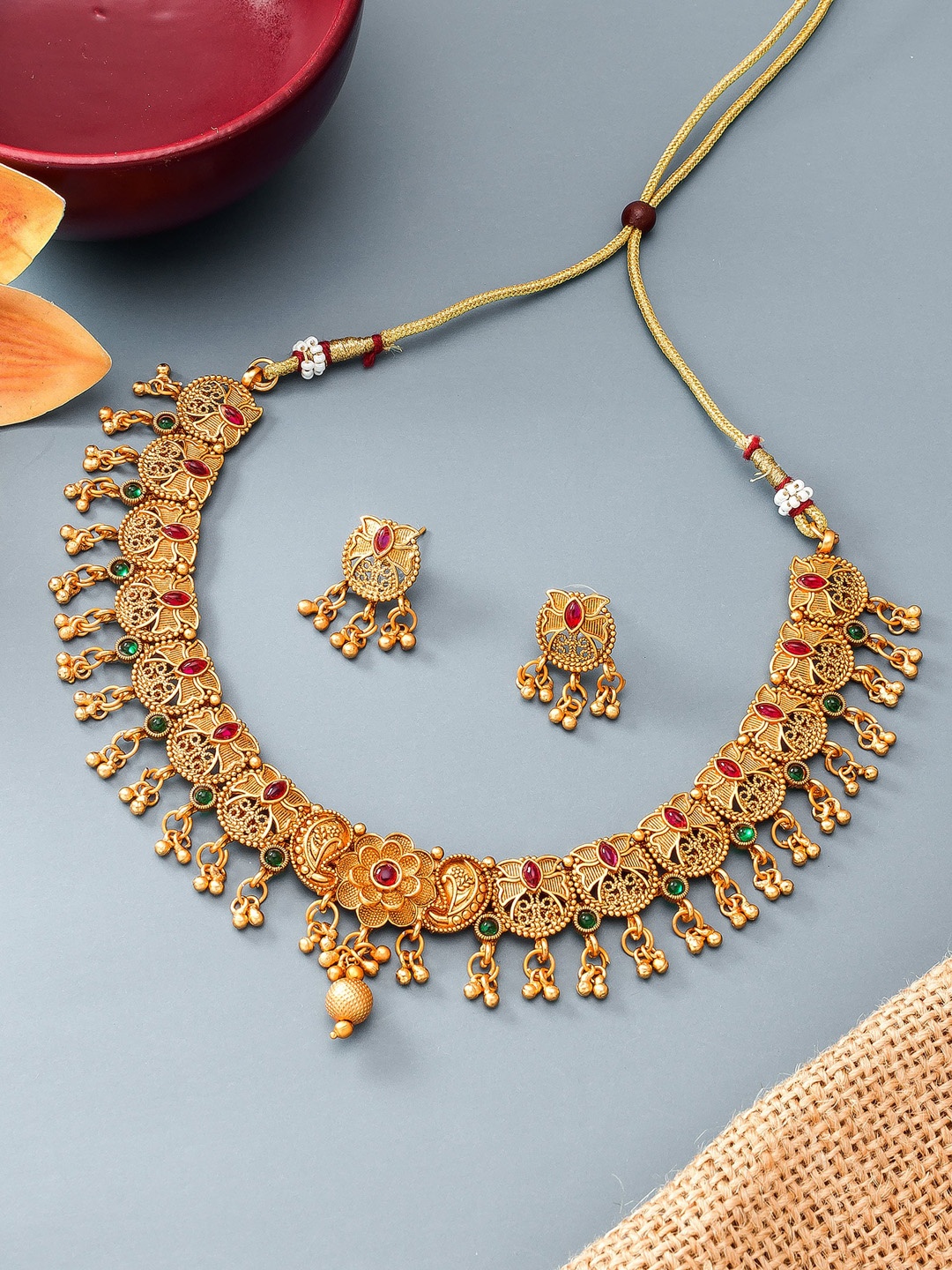 

Aadita Gold-Plated Red Studded Choker Jewellery Set