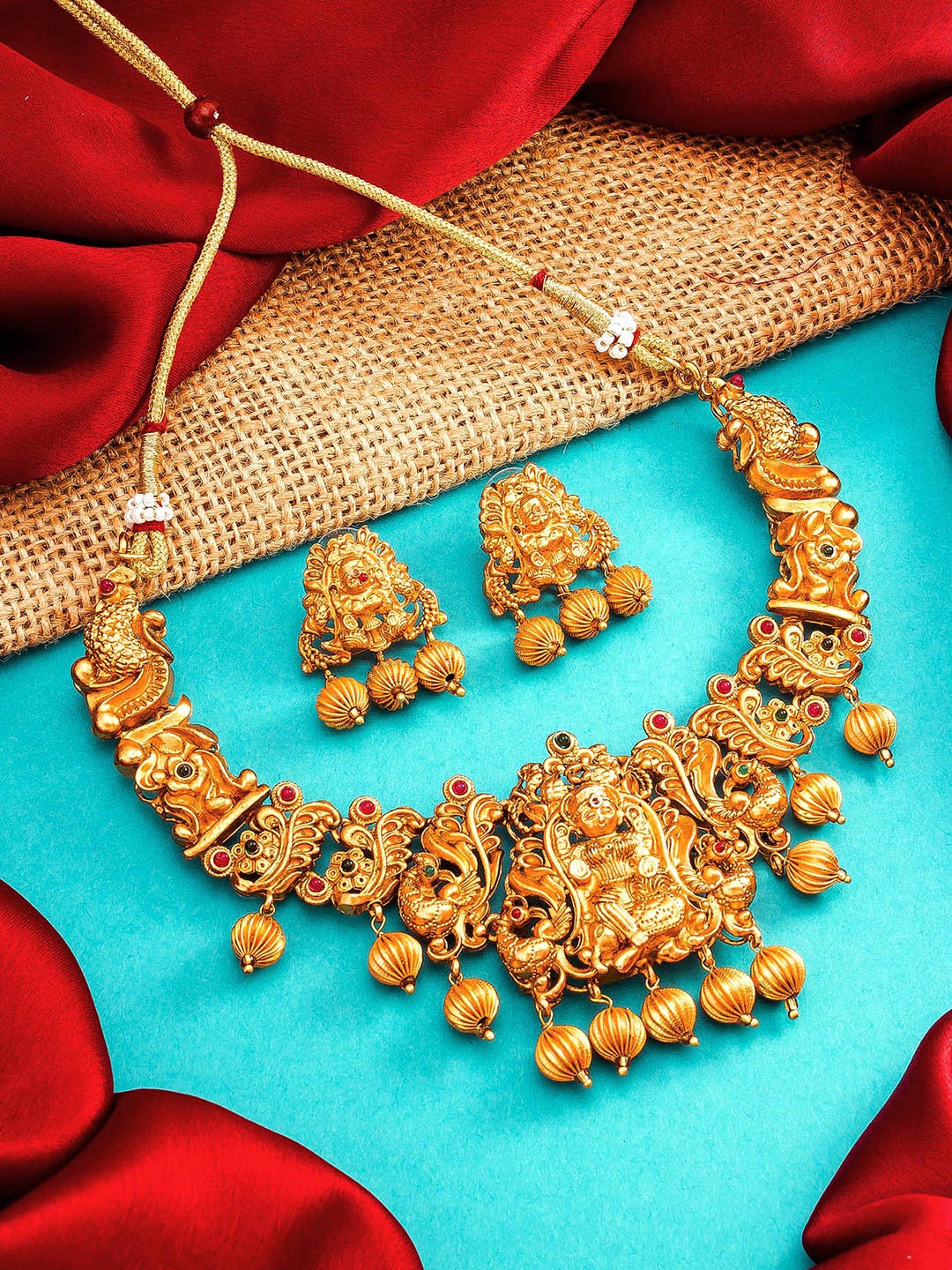 

aadita Gold Plated Temple Choker Jewellery Set