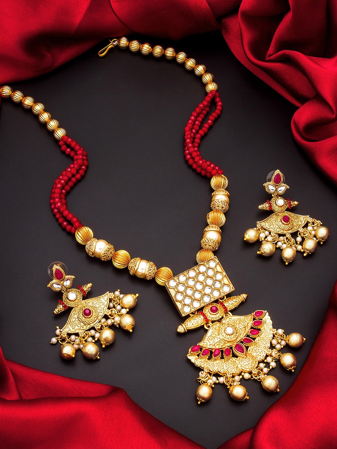 

aadita Gold-Plated Stone Studded Jewellery Set