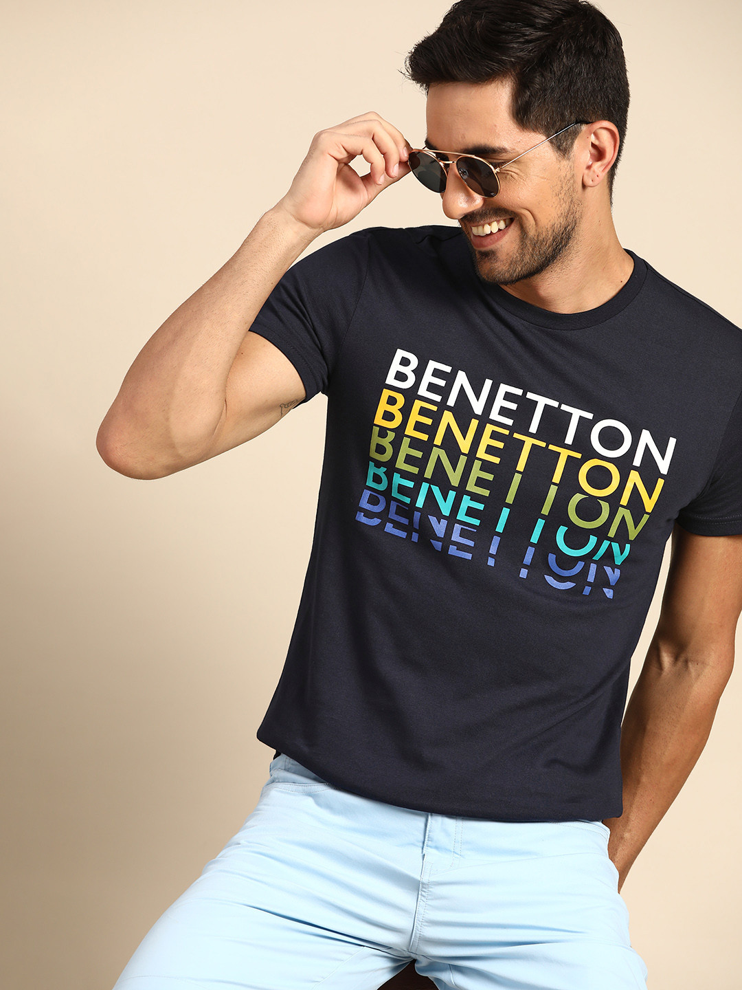 

United Colors of Benetton Men Navy Blue & Yellow Pure Cotton Brand Logo Printed T-shirt