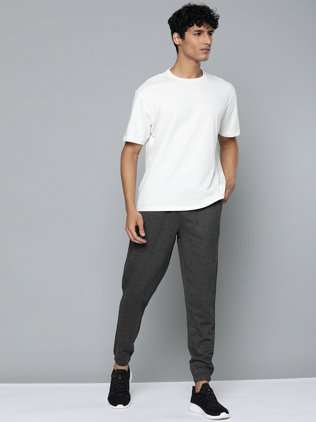 

HRX By Hrithik Roshan Lifestyle Men Anthra Mel Bio-Wash Solid Track Pants, Charcoal