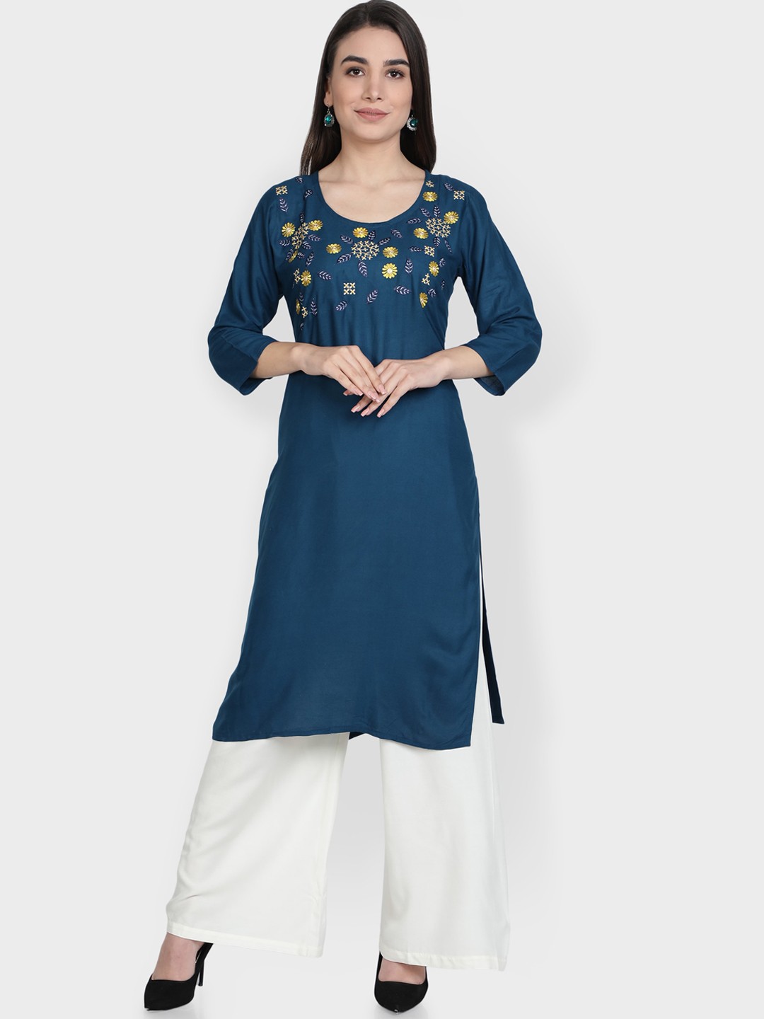 

Fabclub Women Teal Embroidered Kurta with Palazzos