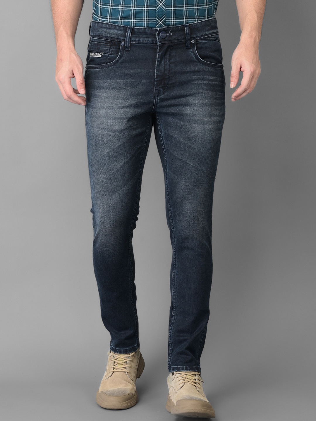 

Canary London Men Blue Smart Tapered Fit Low-Rise Heavy Fade Stretchable Jeans