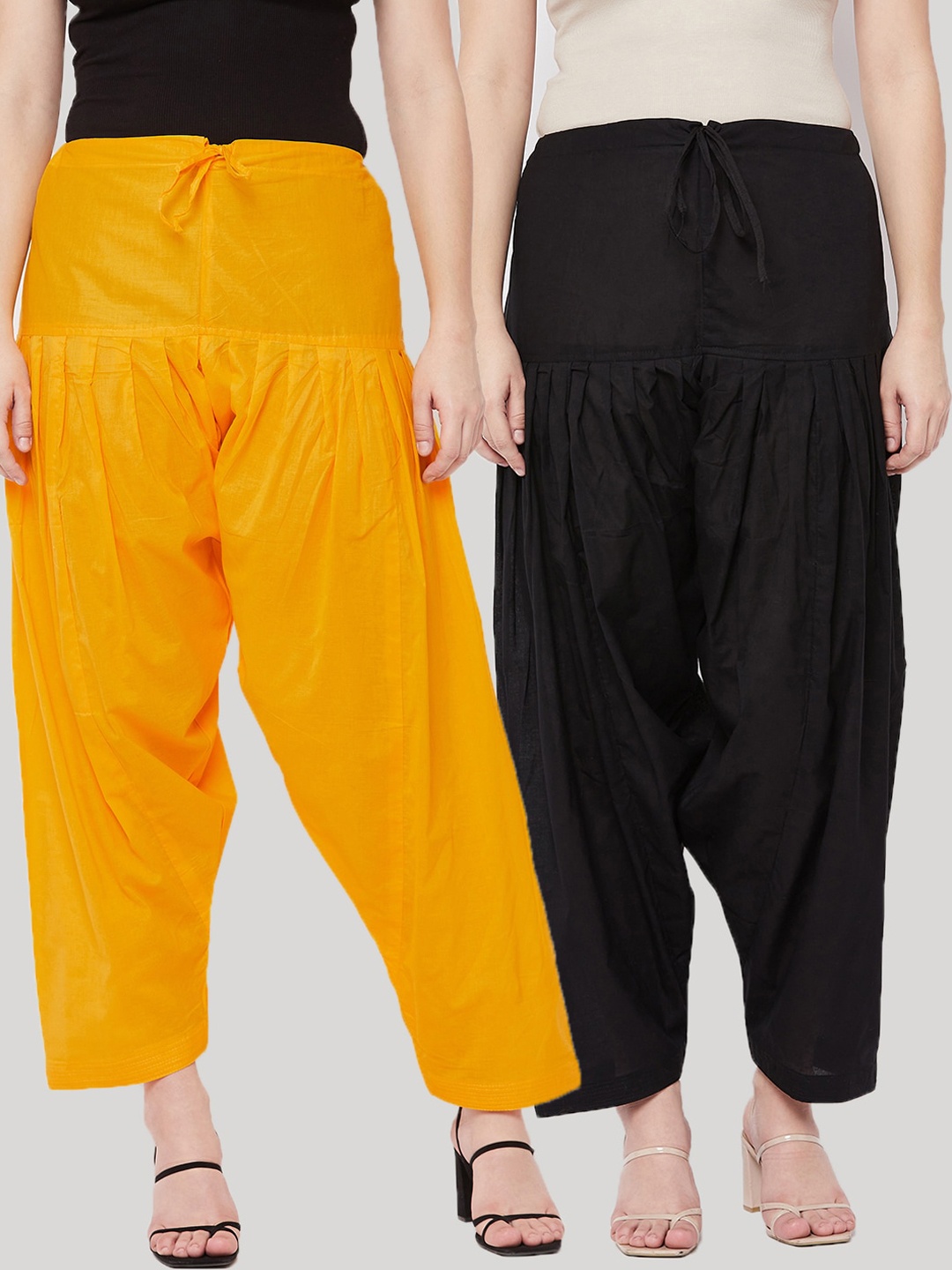 

Clora Creation Women Black & Yellow Pack Of 2 Solid Pure Cotton Salwars