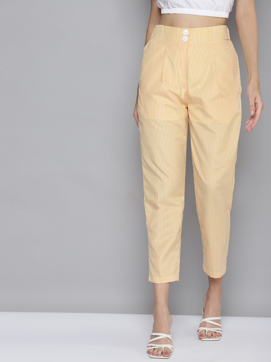 

SASSAFRAS Women Yellow Printed Tapered Fit High-Rise Cropped Trousers
