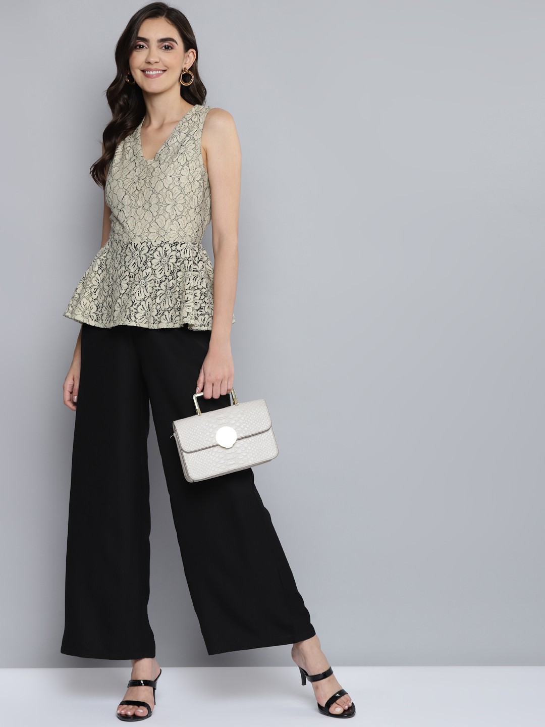

SASSAFRAS Beige & Black Colourblocked Lace Sleeveless Peplum Jumpsuit