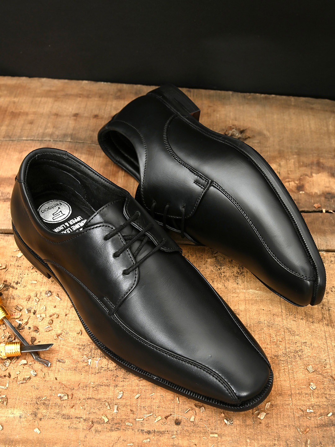 

Fentacia Men Black Solid Genuine Leather Formal Derbys