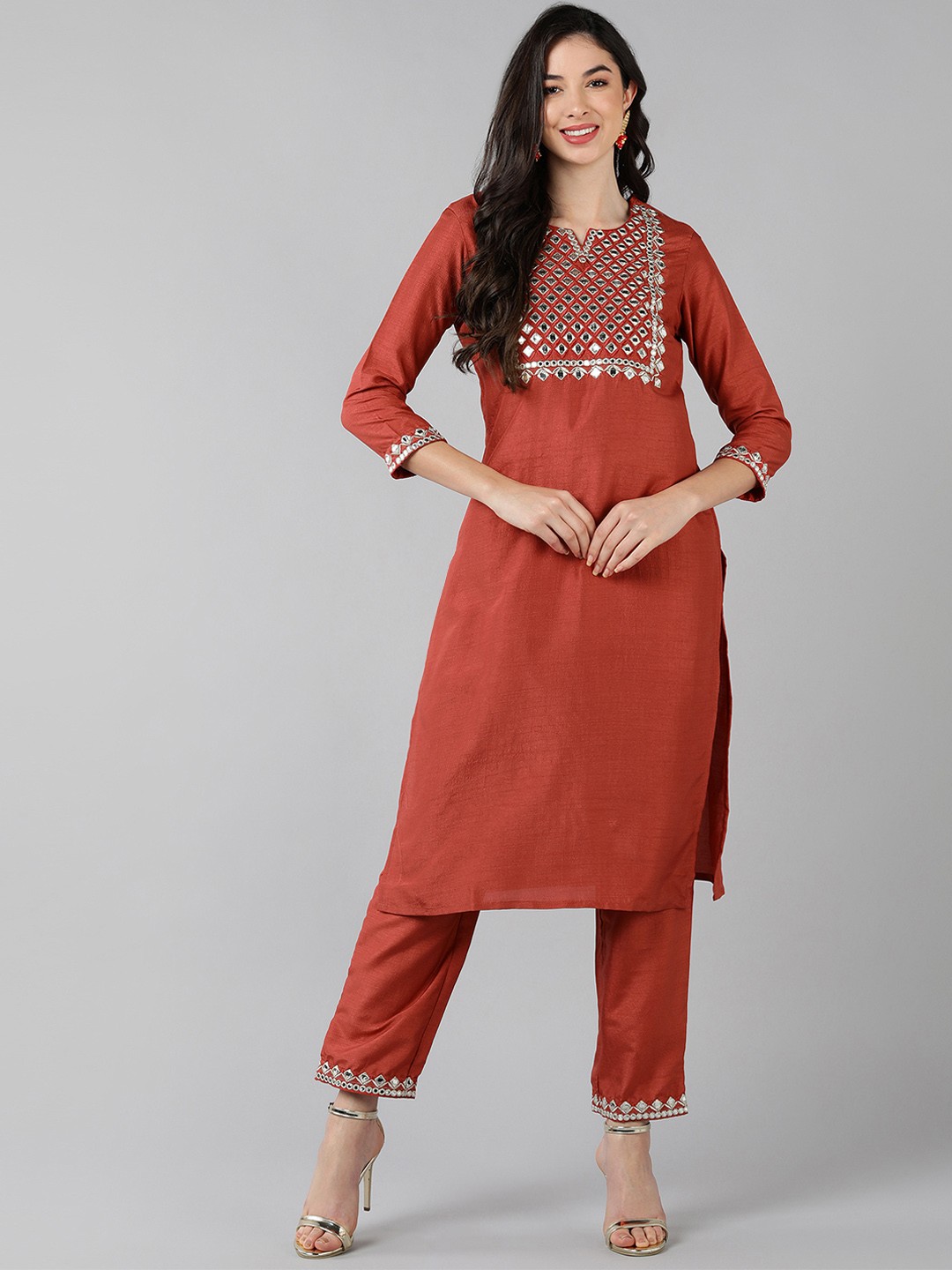 

AHIKA Women Rust Ethnic Motifs Yoke Design Kurta with Trousers
