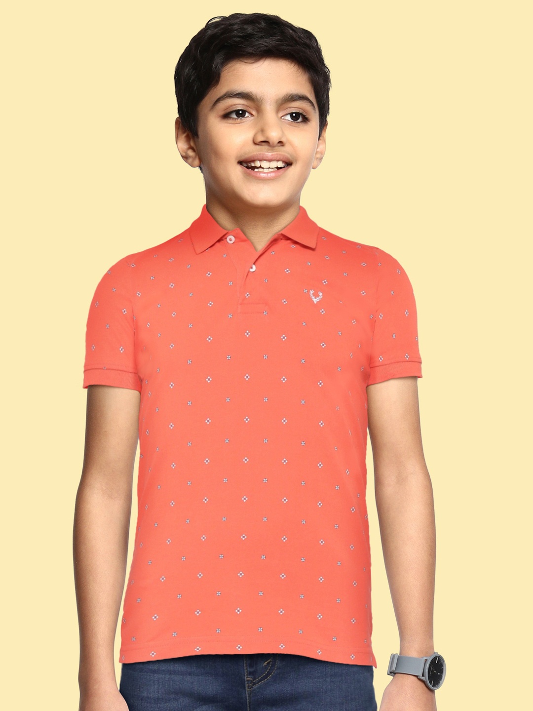 

Allen Solly Junior Boys Coral Orange & White Printed Polo Collar Pure Cotton T-shirt