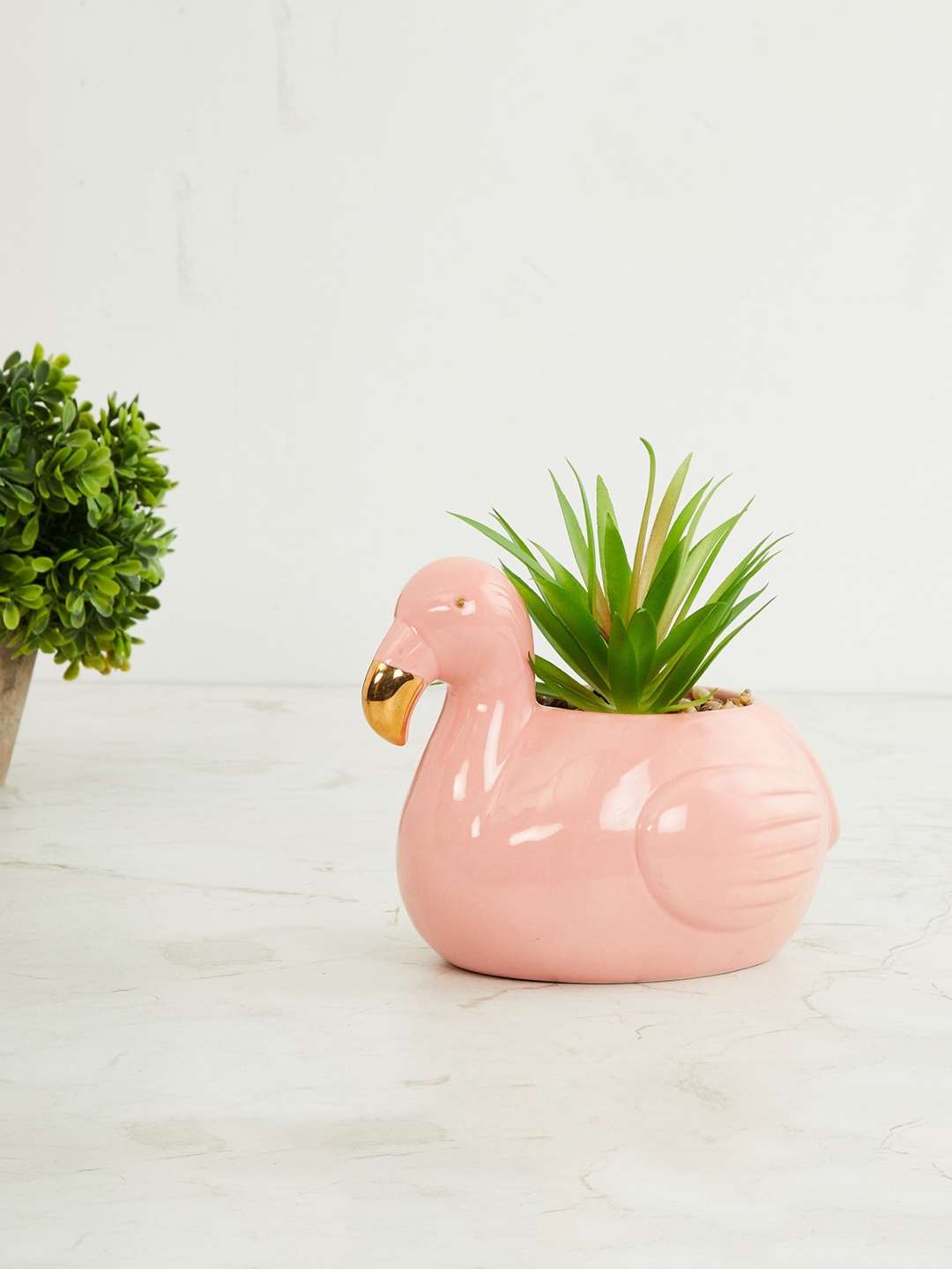 

Home Centre Peach Solid Artificial Succulent With Flamingo Pot