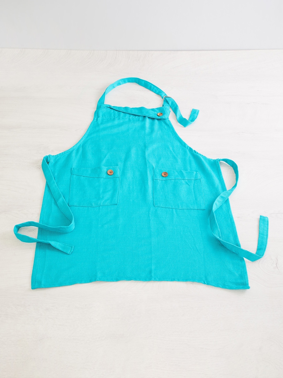 

Home Centre Blue Solid Cotton Aprons