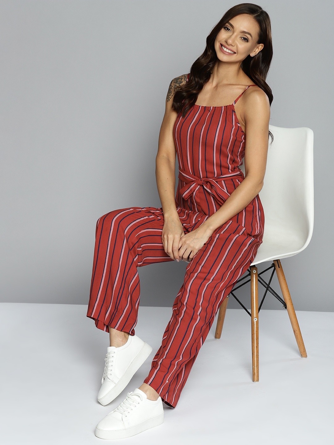 

Mast & Harbour Maroon & Navy Blue Striped Smocked Detail Jumpsuit Comes with a Belt