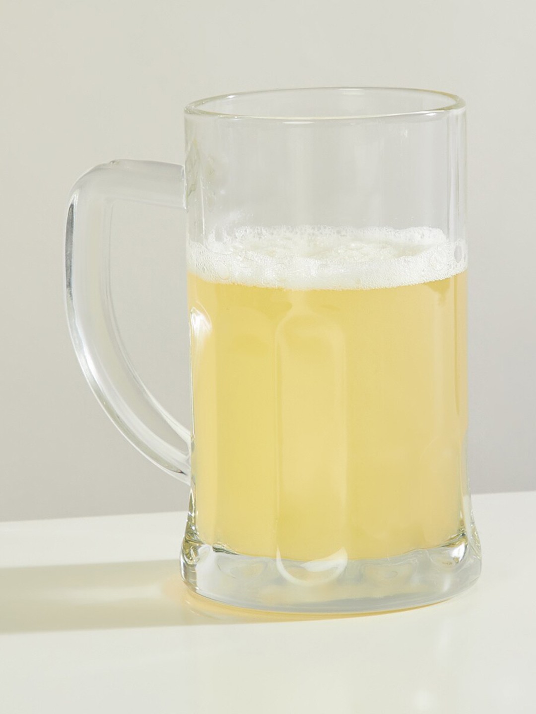 

Home Centre Transparent Textured Beer Glass 500 ml