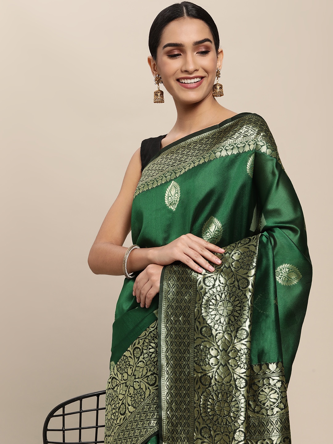 

Shaily Green Woven Design Saree