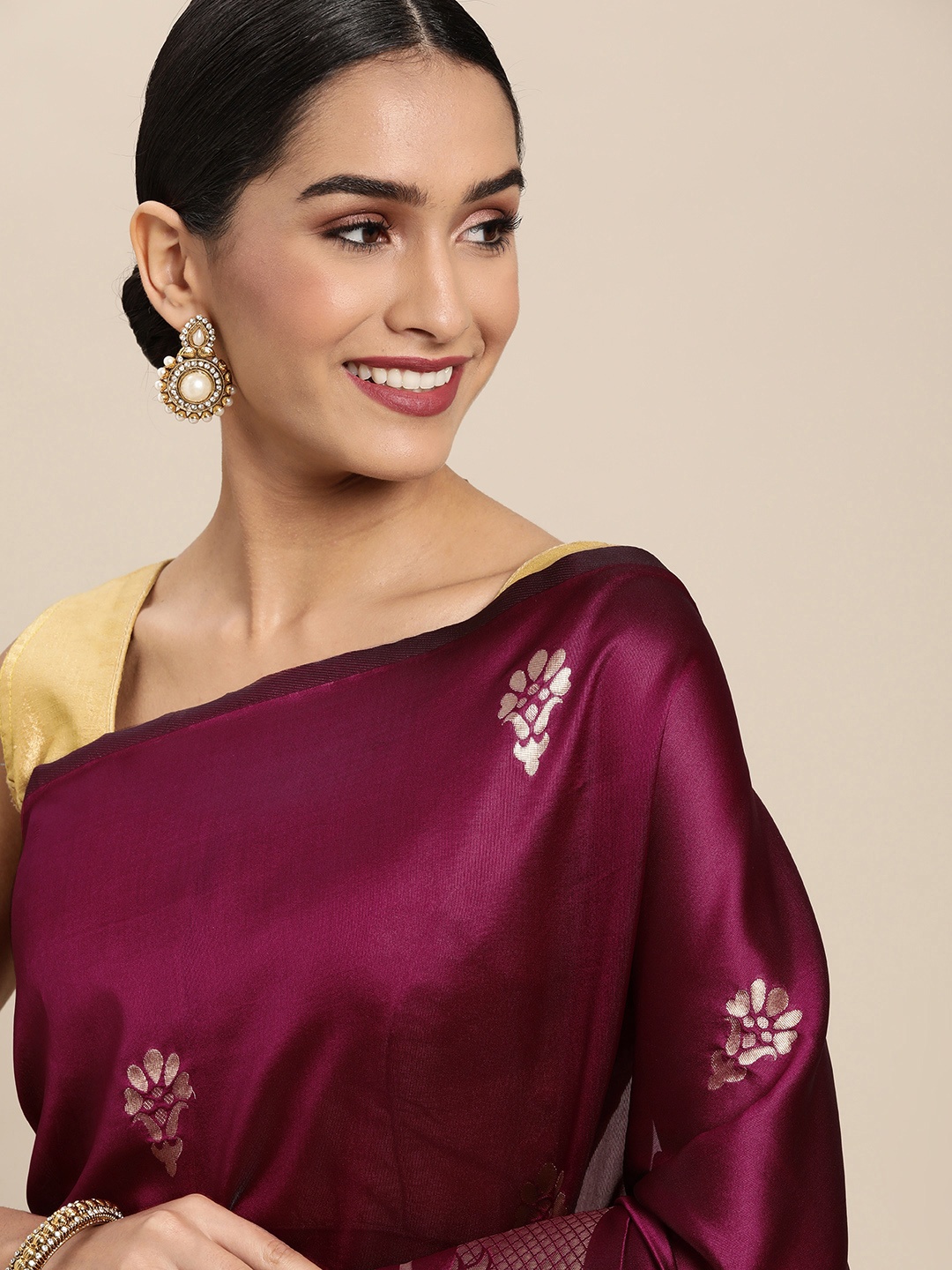 

Shaily Maroon Woven Design Saree