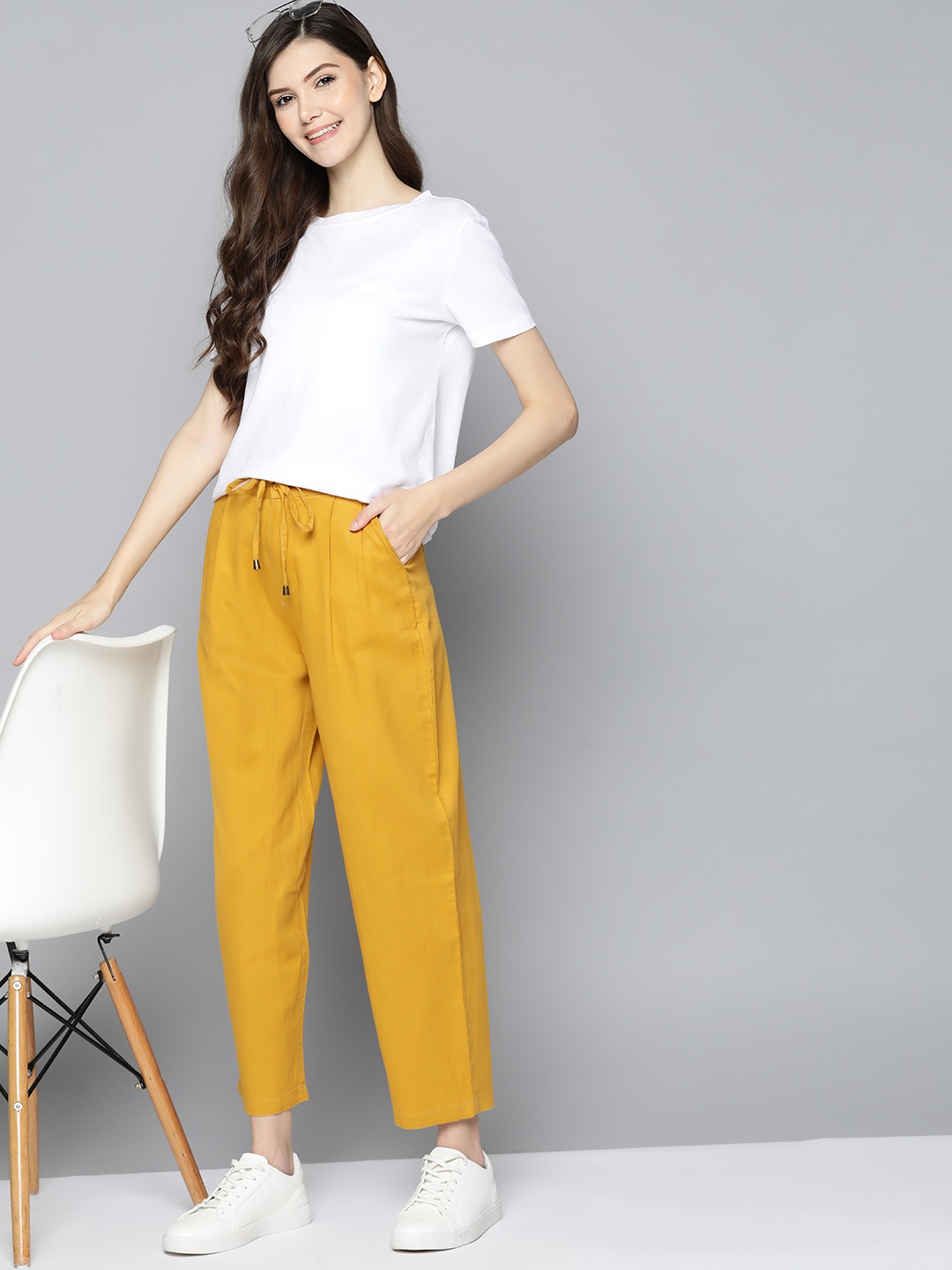 

Mast & Harbour Women Mustard Yellow Cotton Pleated Trousers