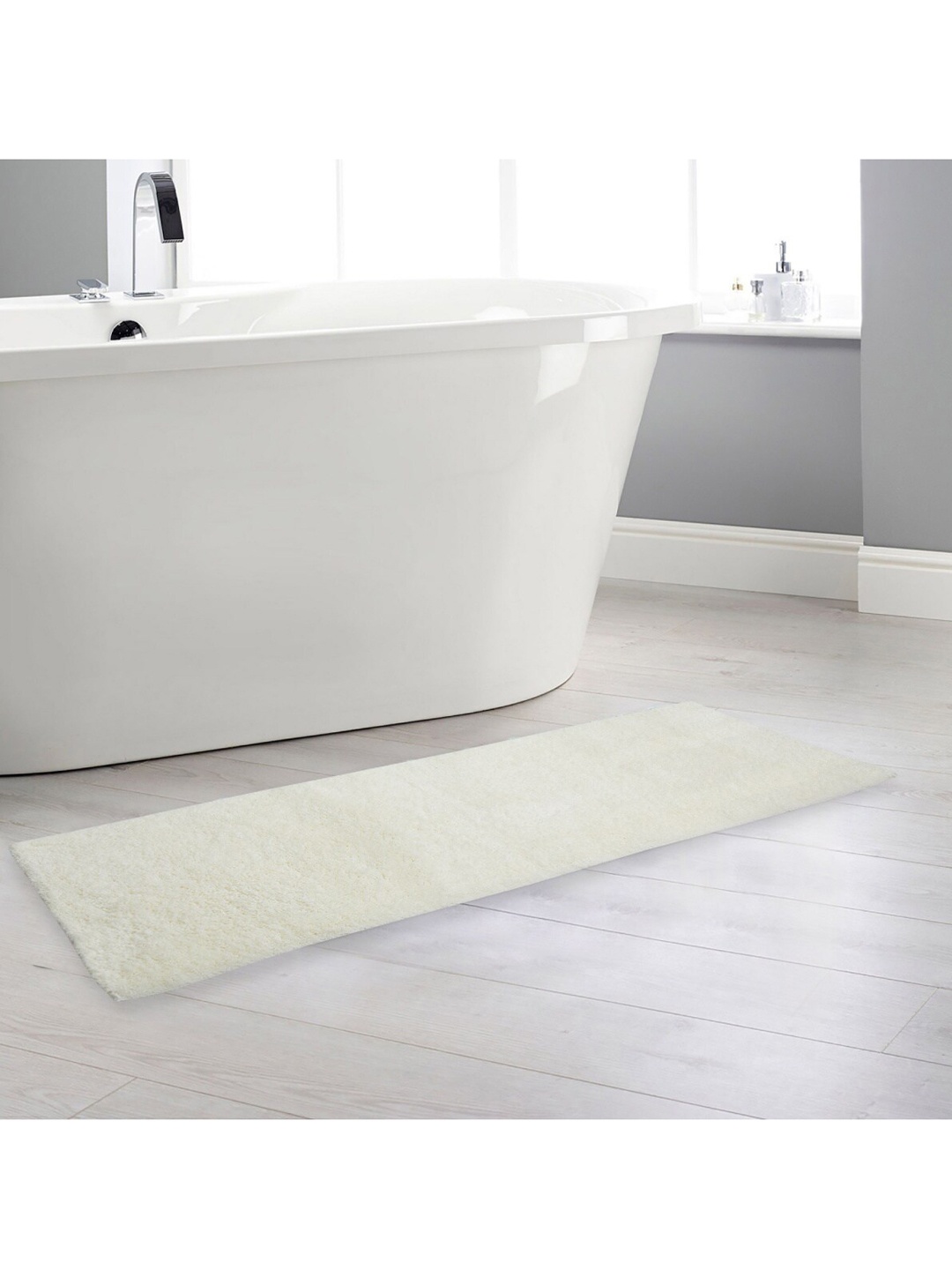 

Home Centre Beige Solid Single Bath Runner