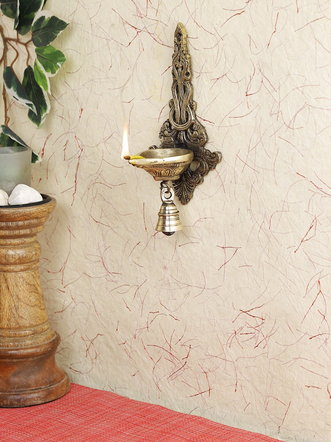 

Imli Street Brass Small Wall Hanging Diya With Bell, Gold