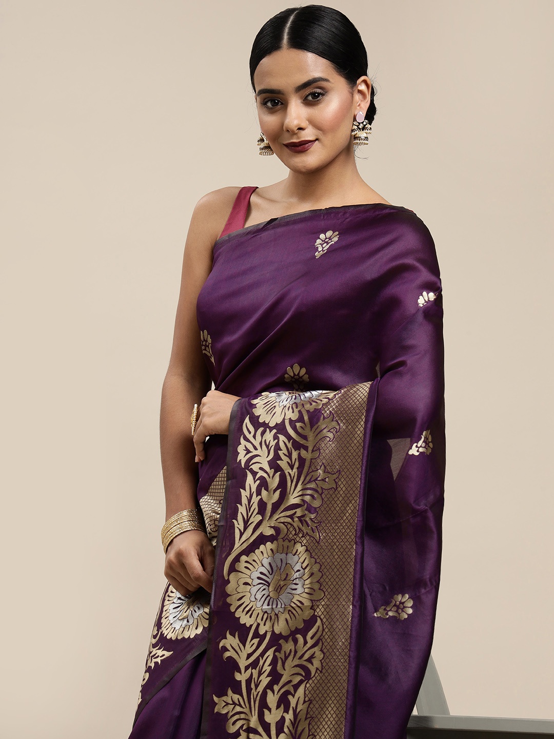 

Mitera Purple & Golden Ethnic Motifs Zari Silk Blend Saree