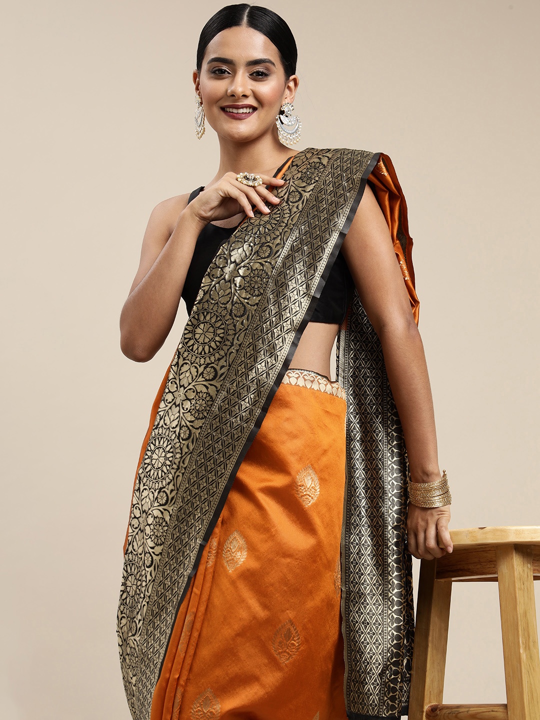 

Mitera Mustard Yellow & Black Ethnic Motifs Zari Silk Blend Saree