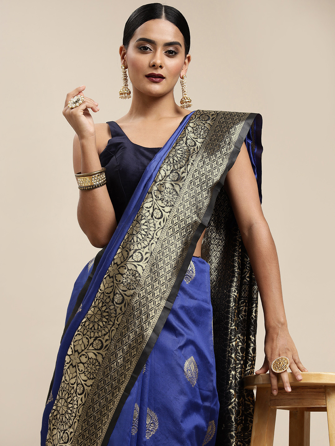 

Mitera Navy Blue & Black Ethnic Motifs Zari Silk Blend Saree