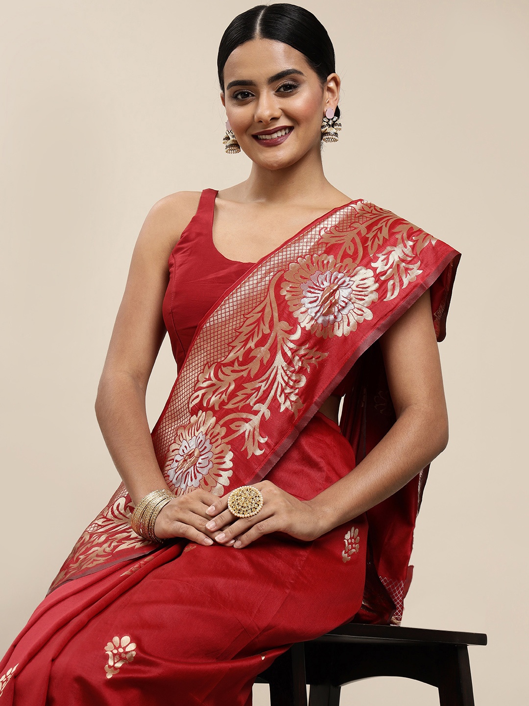 

Mitera Maroon & Golden Ethnic Motifs Zari Silk Blend Saree