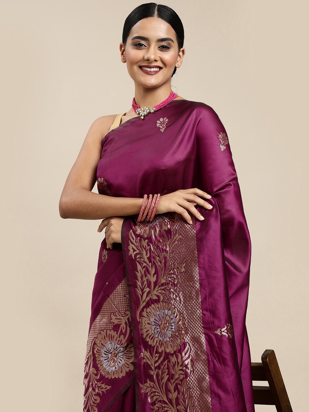 

Mitera Burgundy & Golden Ethnic Motifs Zari Silk Blend Saree