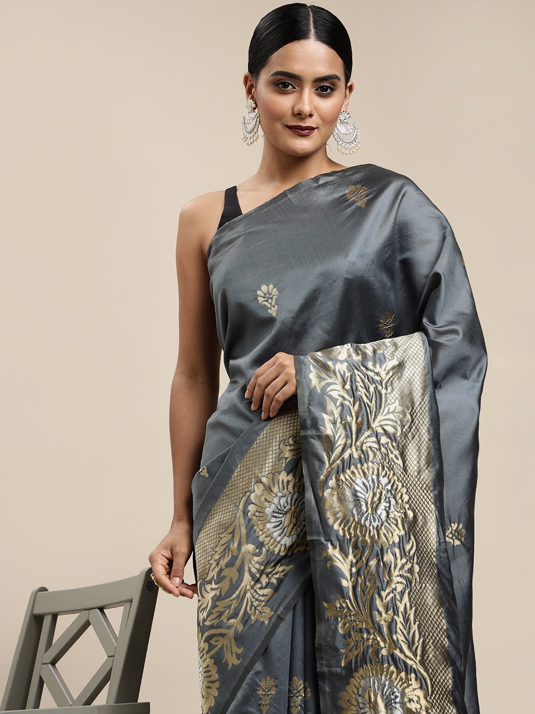 

Mitera Grey & Golden Ethnic Motifs Zari Silk Blend Saree