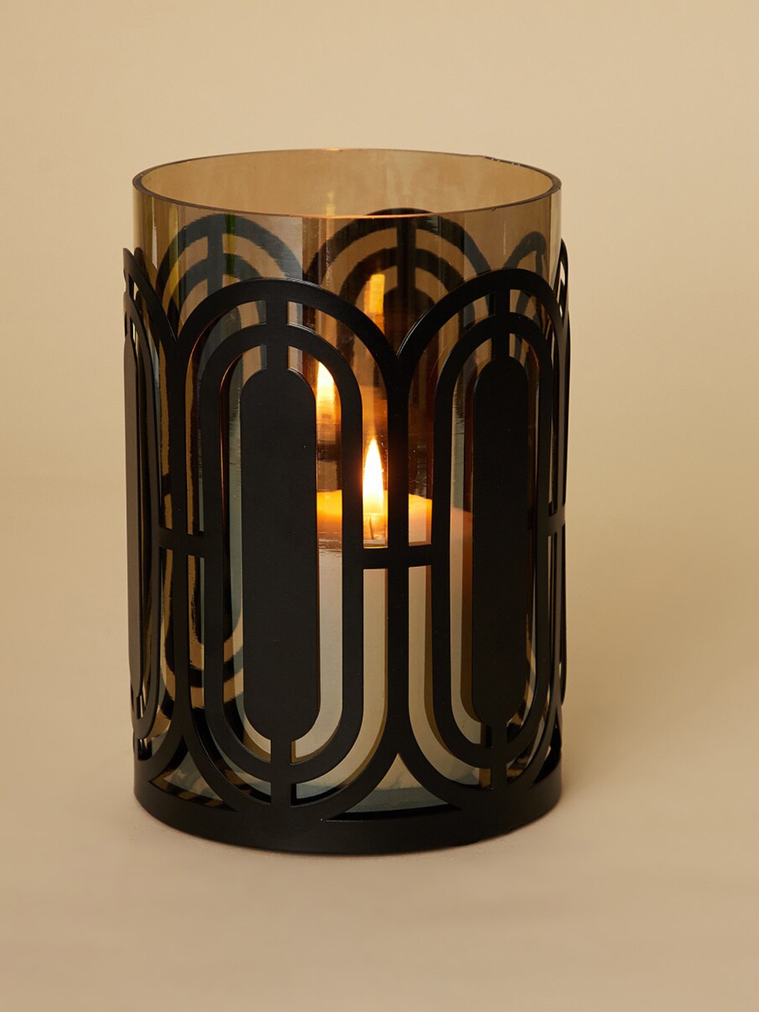 

Home Centre Transparent & Black Metal Candle Holder